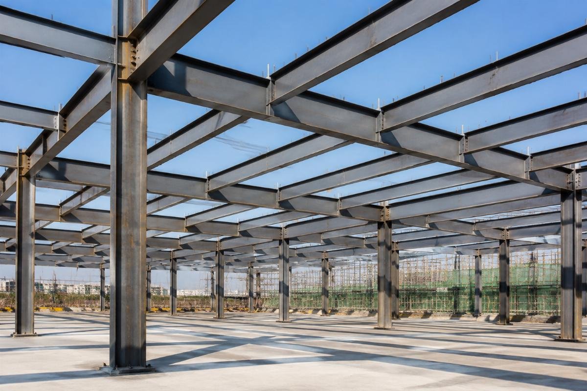 Construction site featuring H-beam columns and I-beam secondary supports in a steel framework