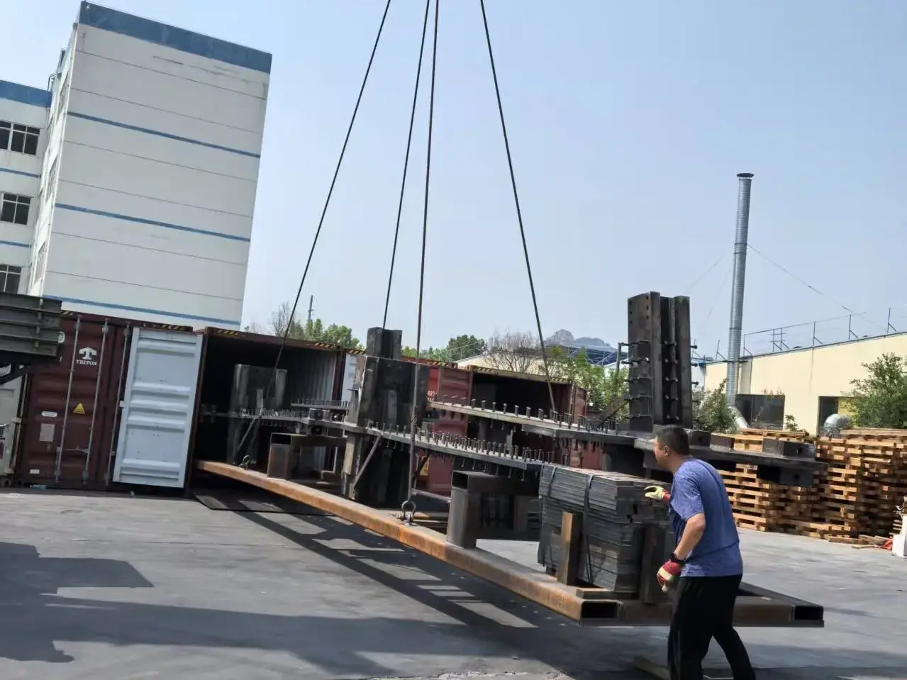 Bundled steel members prepared for logistics park construction packages